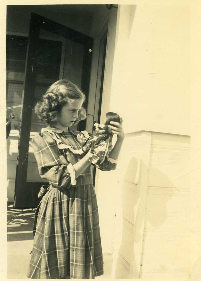 Barbara with Japanese Doll that Dad sent.jpg